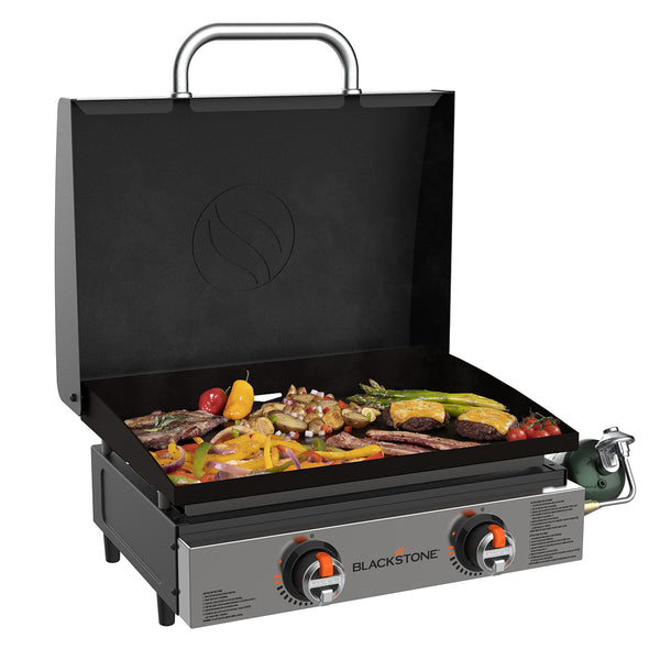 Discover the ultimate in outdoor cooking with the Blackstone 22" Omnivore Stainless Front Panel Hooded Tabletop Griddle, perfect for all your camping and grilling adventures!